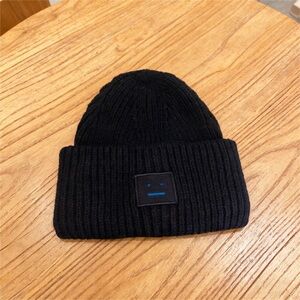 Acne Black Beanie with Blue Patch